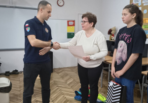 Podziękowania dla prowadzącego spotkanie