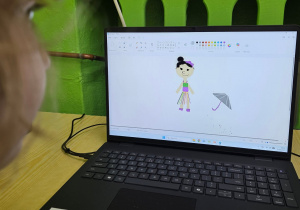 Uczennica narysowała ekostrój.